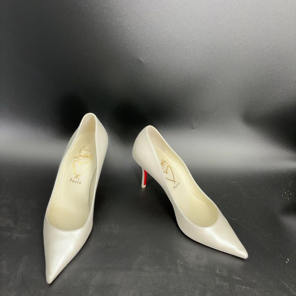 Christian Louboutin White Pointed-Toe Pumps with Red Stiletto